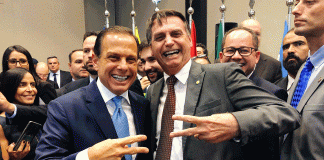 Bolsonaro no Planalto e Doria no Bandeirantes: Cada um com o seu negacionismo